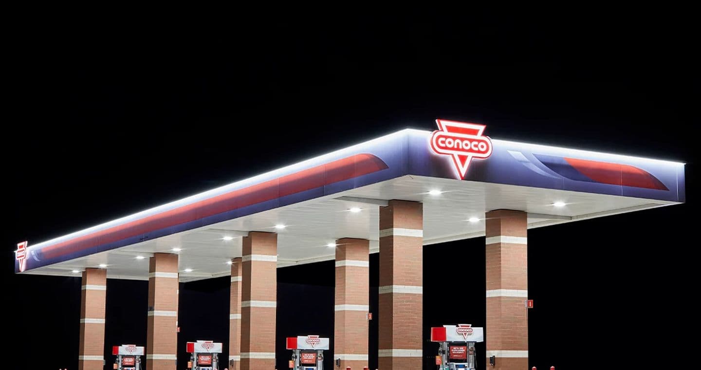 Conoco station canopy at night.