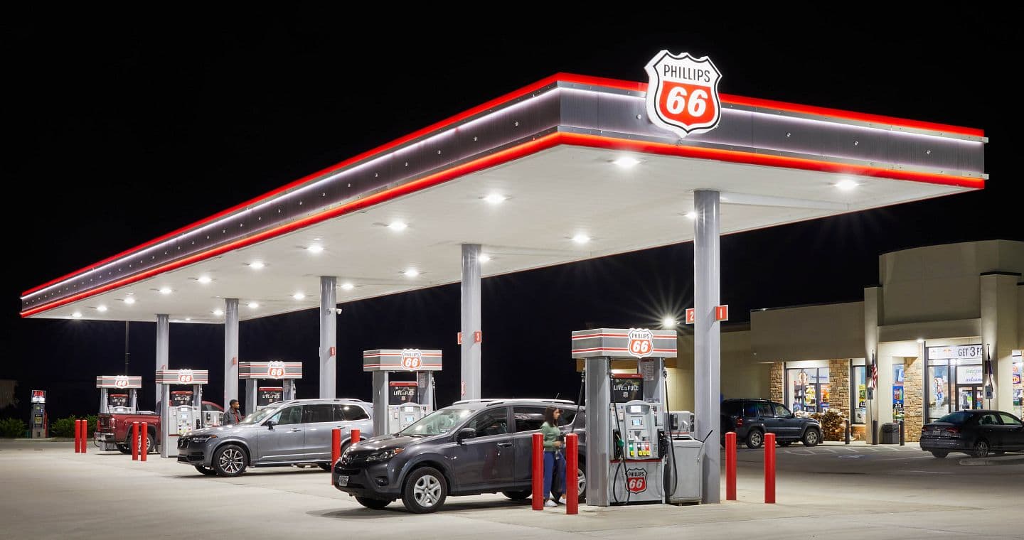 Phillips 66 station and store at night.